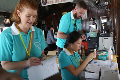 WeCARE medical team performs PCR testing using the GeneXpert system.